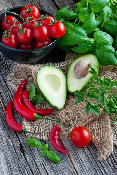 Colorful fresh organic vegetables on wooden board — Stock Photo, Image