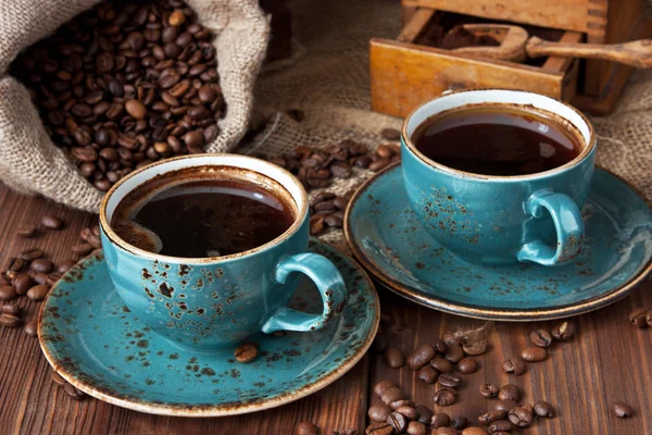 Cangkir kopi dan biji kopi — Stok Foto