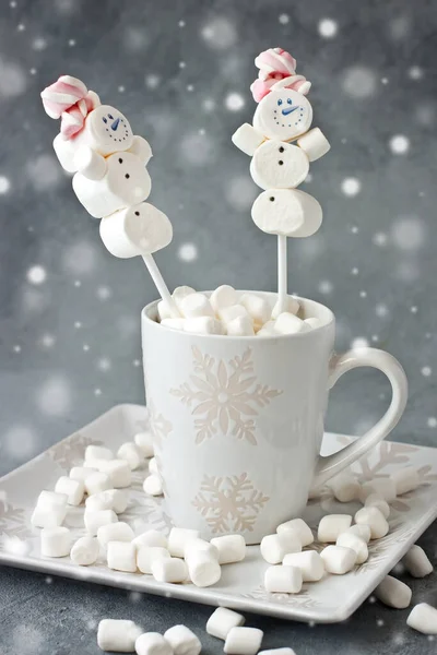 Cup of creamy hot chocolate with melted marshmallows    for christmas holiday , close-up with selective focus, shallow depth of field