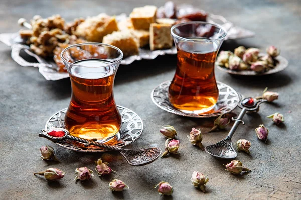 Turkish  tea with Turkish delight and traditional copper serving set