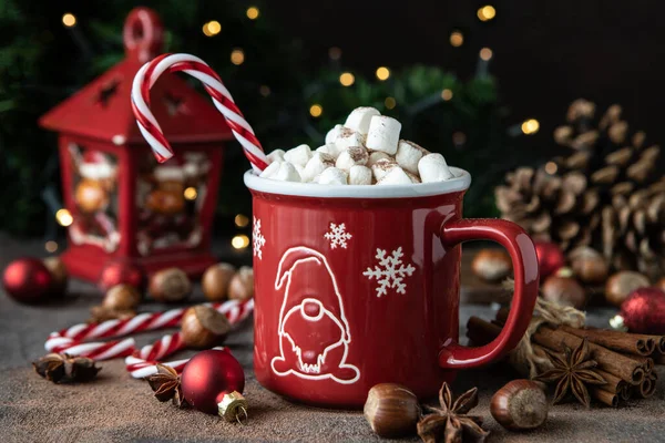 Cup of creamy hot chocolate with melted marshmallows   for christmas holiday