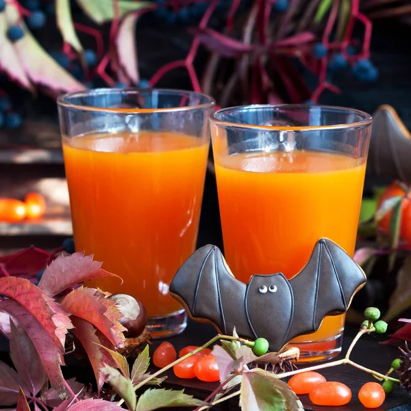 Glass Fresh Pumpkin Carrot Juice Decorated Halloween Flying Bat Served — Stock Photo, Image