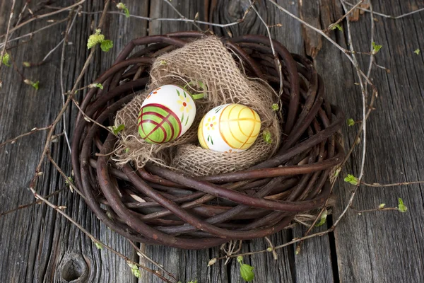 Easter composition with eggs and  spring branches — Stock Photo, Image