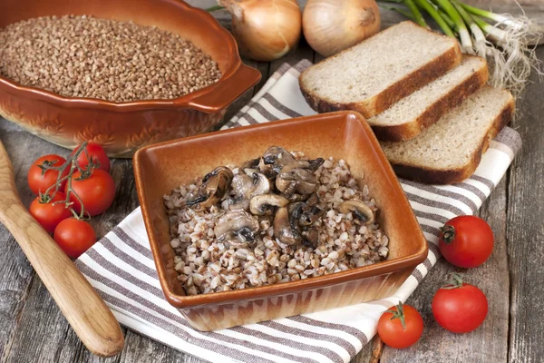 Buckwheat porridge with mushrooms — Stock Photo, Image