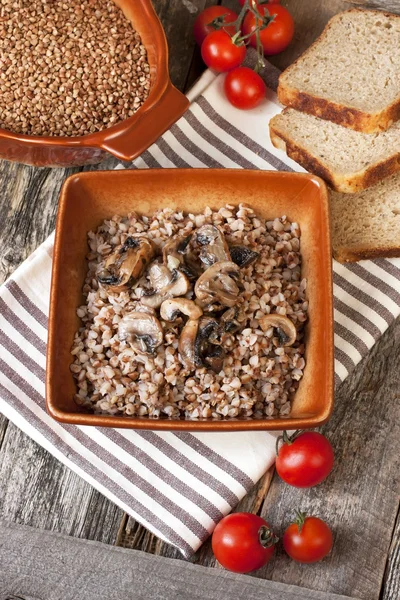 Buckwheat porridge with mushrooms — Stock Photo, Image