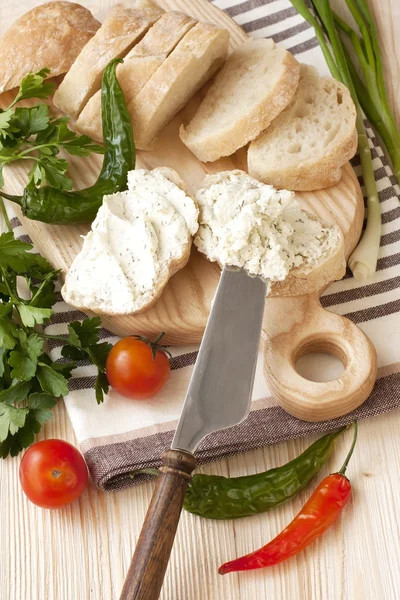 Freshly baked traditional ciabatta bread on wooden board — Stock Photo, Image