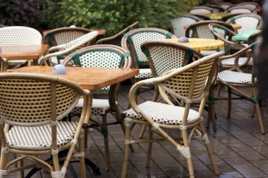 Cozy cafe with chairs on the street