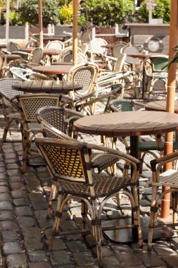 Cozy cafe with chairs on the street