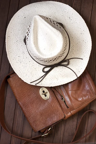 Men bag and straw hat — Zdjęcie stockowe