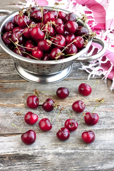 Cherries on wooden table — Stock Photo, Image