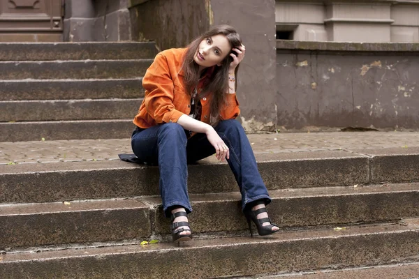 Beautiful young woman with long brown hair — Stock Photo, Image