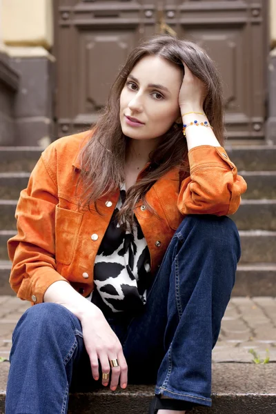 Beautiful young woman with long brown hair — Stock Photo, Image