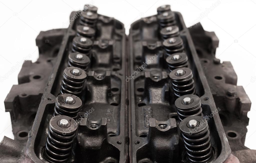 Opened old engine heads Stock Photo by ©matusciac 84346692