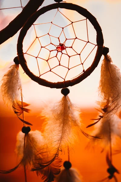 Black and white photo of a dream catcher at sunset purple dark background — Stock Photo, Image