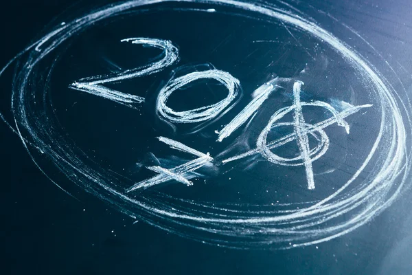 2016 crossed and new years 2017 on chalkboard — Stock Photo, Image