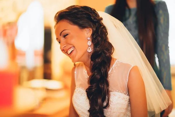 Beautiful young bride with wedding makeup and hairstyle in bedroom, newlywed woman final preparation for wedding. Happy Bride waiting groom. Marriage Wedding day moment. portrait soft focus — Stock Photo, Image