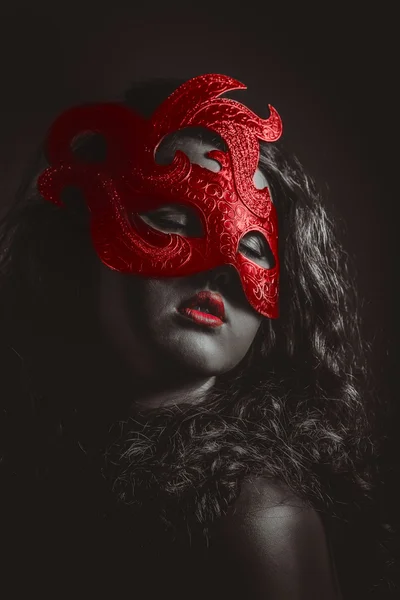 Beautiful Woman with mask over her Eyes. Red Sexy Lips. Black and white portrait — Stock Photo, Image