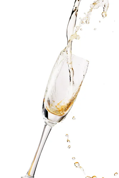 White wine splashing out of glass, isolated on white background — Stock Photo, Image