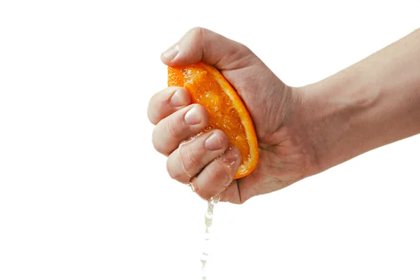 Man dramatic squeezes orange. Conceptis tired from work. — Stock Photo, Image