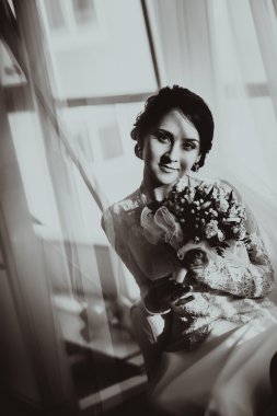 Gelin elbise ve peçe bir buket ile suni silüeti