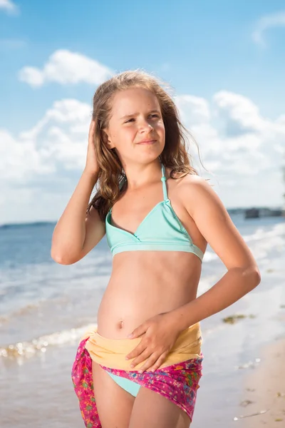 Portrait of merry little girl posing at camera — Stock Photo, Image