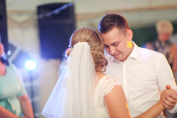 Beautiful touching first dance of the bride and groom — Stock Photo, Image