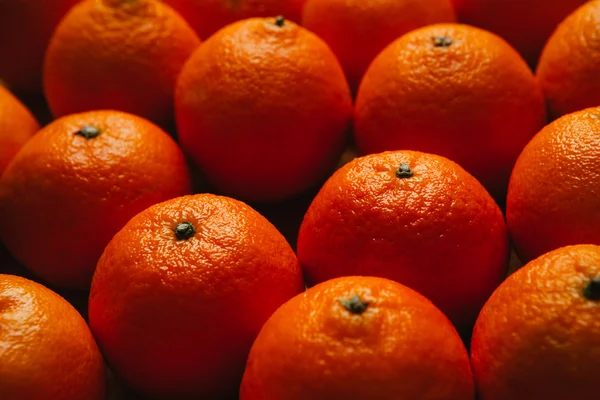 Many beautiful fresh orange tangerines close up — Stock Photo, Image