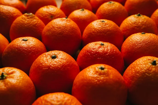 Many beautiful fresh orange tangerines close up — Stock Photo, Image