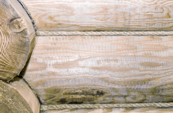 Fragment of the wall executed from round logs. — Stock Photo, Image