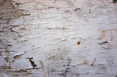 Eski çatlamış ve gri boyayla kaplı ahşap yüzey. Grunge tarzında arkaplan resmi. Yukarıdan görünüşü.