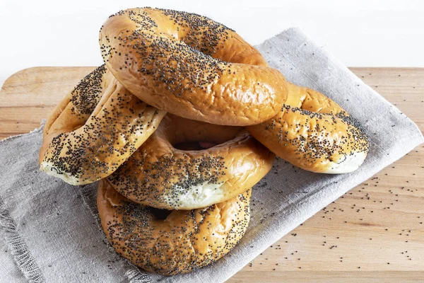 Bagels with poppy seeds on a napkin Stock Picture