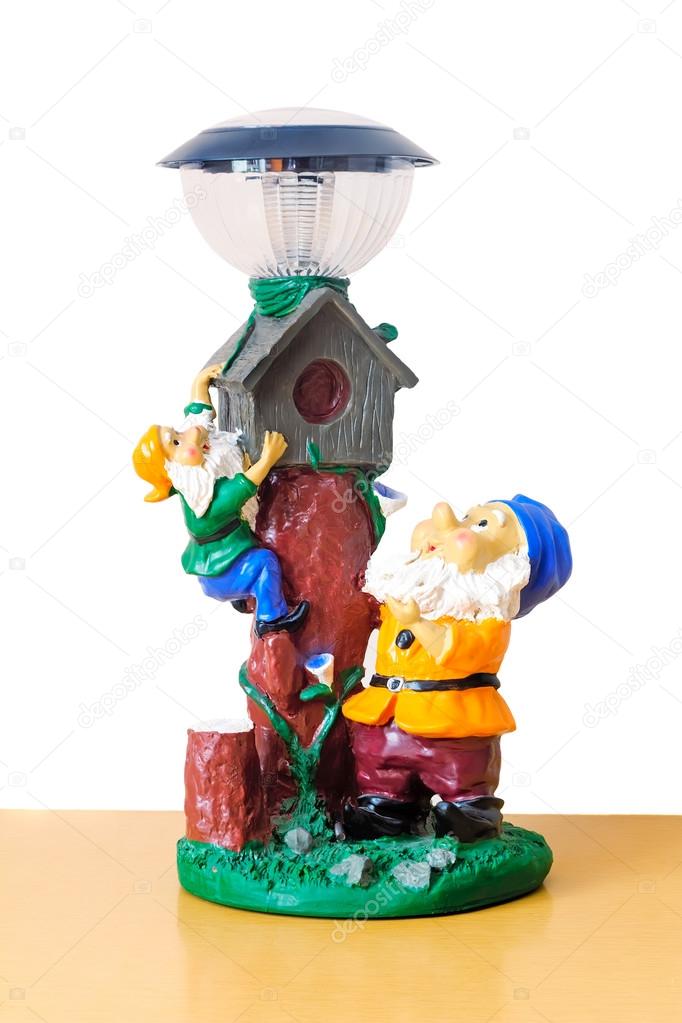 Original lamp with the image of the dwarves.