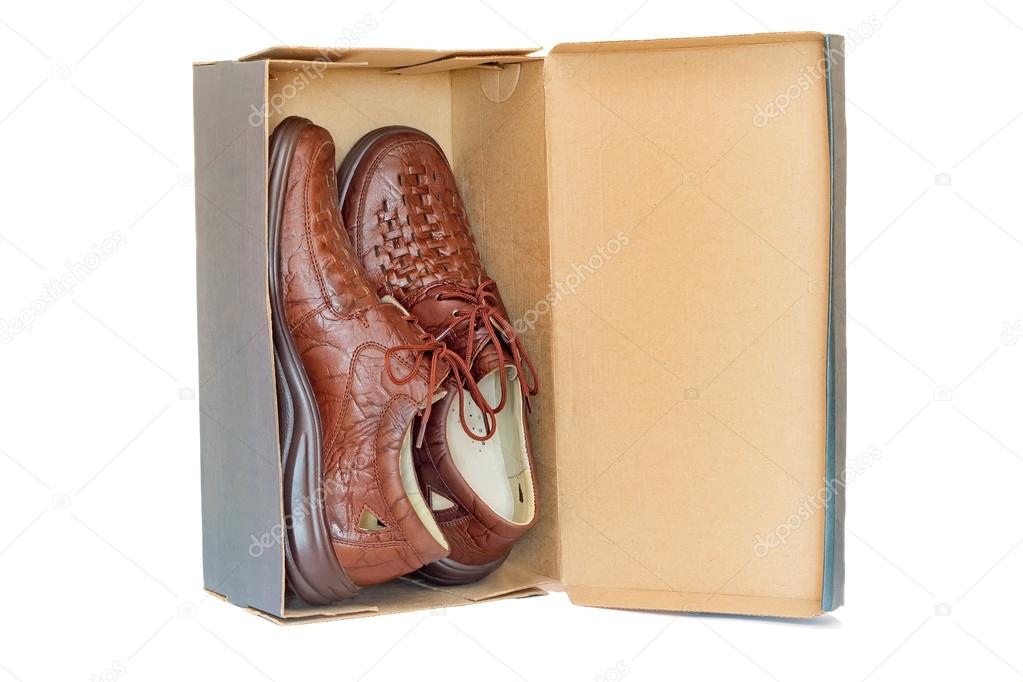Men's shoes in the package on a white background.