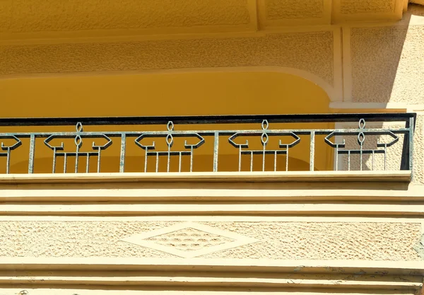 Fragment of a facade of a house with a balcony Royalty Free Stock Photos