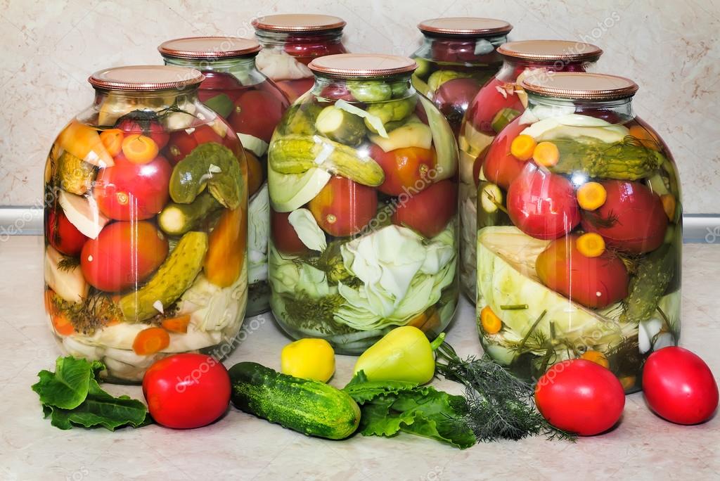 A variety of canned vegetables in glass jars. — Stock Photo