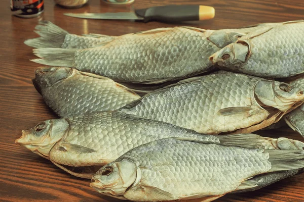 Salted and dried river fish on a white background. — Stock Photo, Image