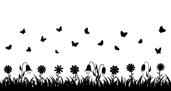 Kelebekler üzerinde çim ve çiçek.