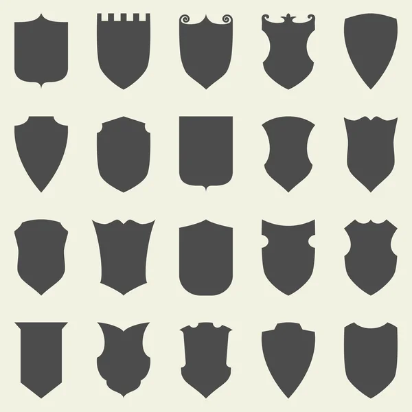 Juego de escudos oscuros vacíos en blanco. Escudo insignia formas icono — Vector de stock