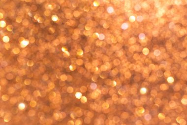 Pembe ve turuncu renkli, bulanık, ışıl ışıl bokeh ışıklar, ışıl ışıl arka plan, sönmüş ışıltı, Noel veya yeni yıl arkaplanı.