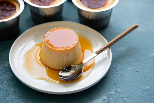 Homemade Flan Creme Caramel Blue Rough Background — Stock Photo, Image