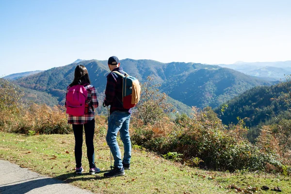 Father His Teenage Daughter Backpacks Sticks Hiking Autumn Looking Landscape — 스톡 사진