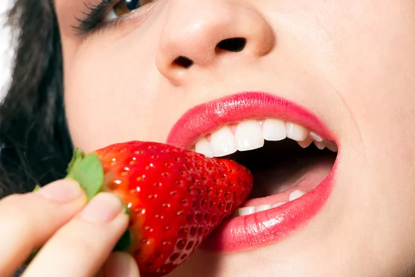 Sexy woman mouth biting strawberry — Stock Photo, Image