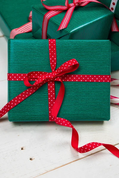 Christmas packages with red bow — Stock Photo, Image