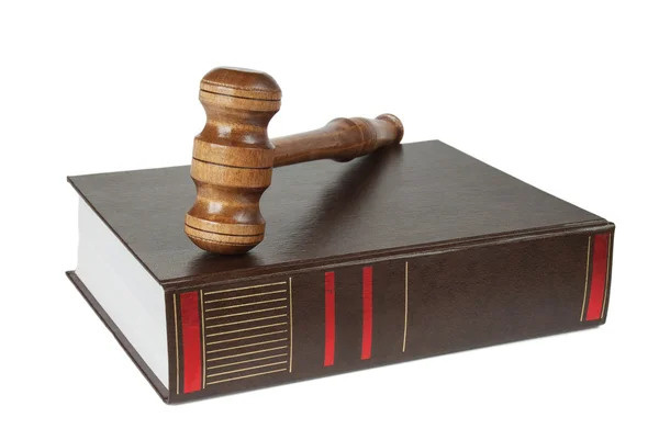 Wood gavel and soundblock on on a thick book — Stock Photo, Image