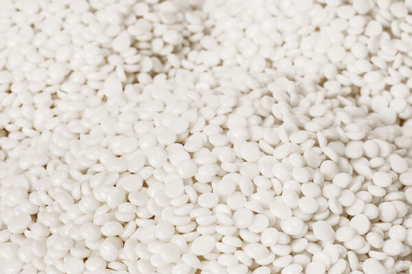 Fine white polymer granules