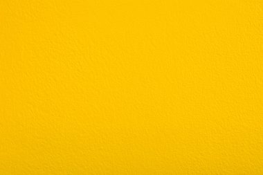 Arka plan olarak sarı beton duvar doku