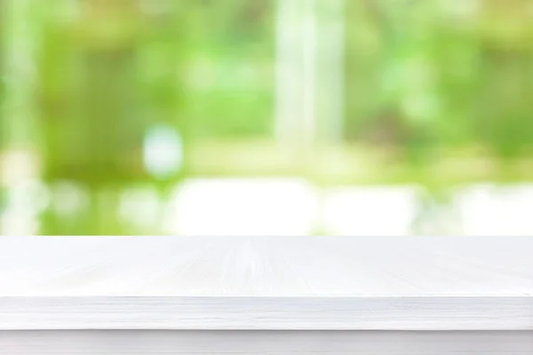 White wood table top on blur green abstract background — Stock Photo, Image