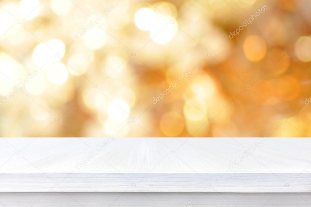 White wood table top on golden bokeh abstract background Stock Photo by