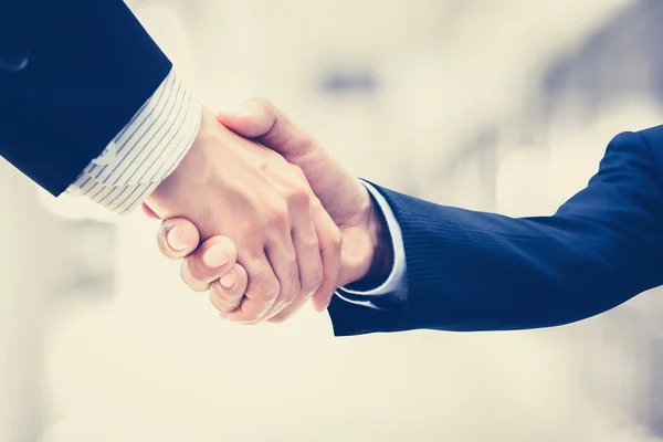 Handshake of businessmen - vintage tone — Stock Photo, Image
