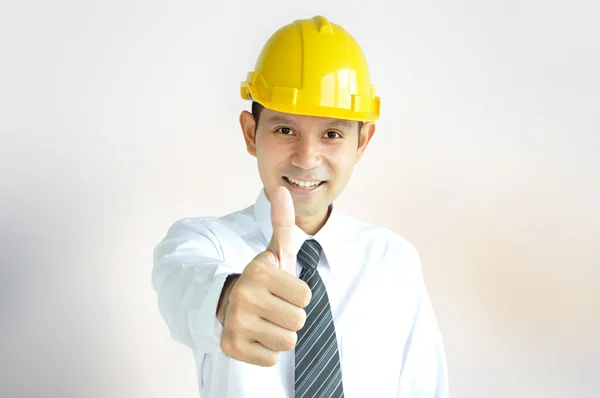 亚洲工程师在硬手势拇指的标志 — 图库照片